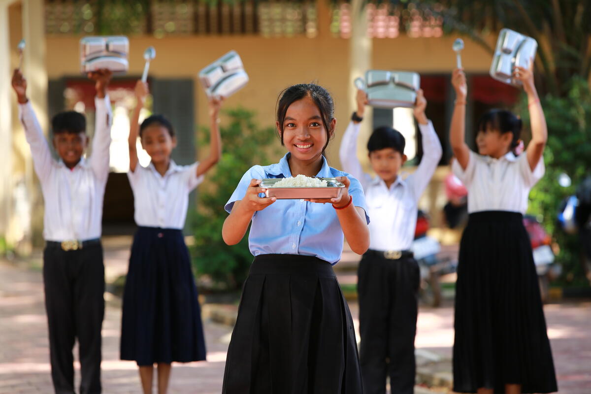 A child with her school meal. 