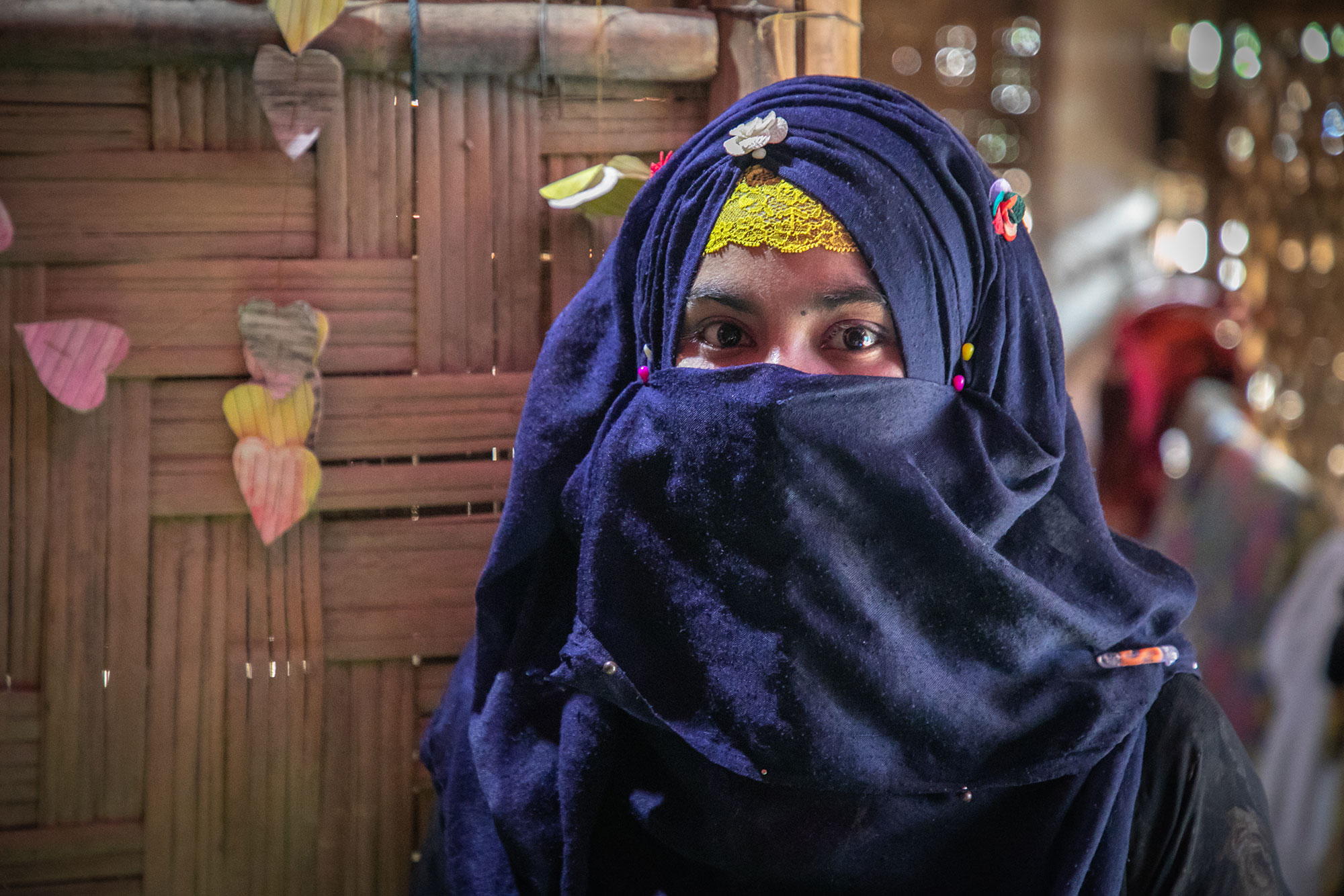 A girl staring into the camera.