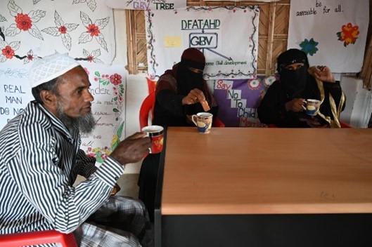 Men discussing community issues.