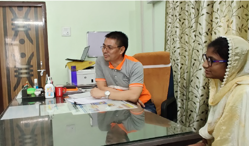 Sama on the video call, alongside World Vision staff