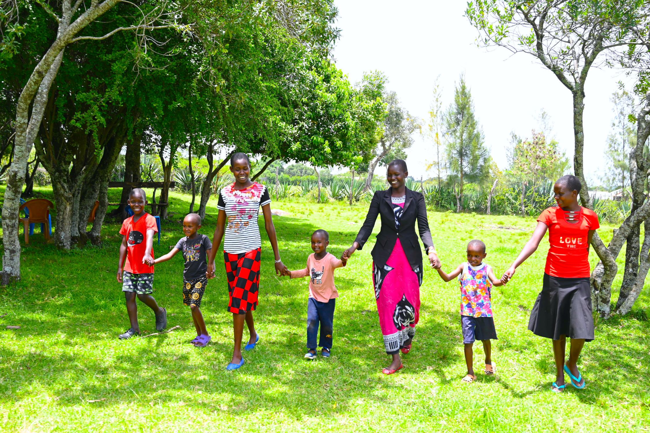 Kenyan children holding hands