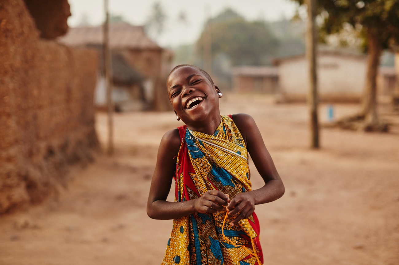 Young girls smiles at camera