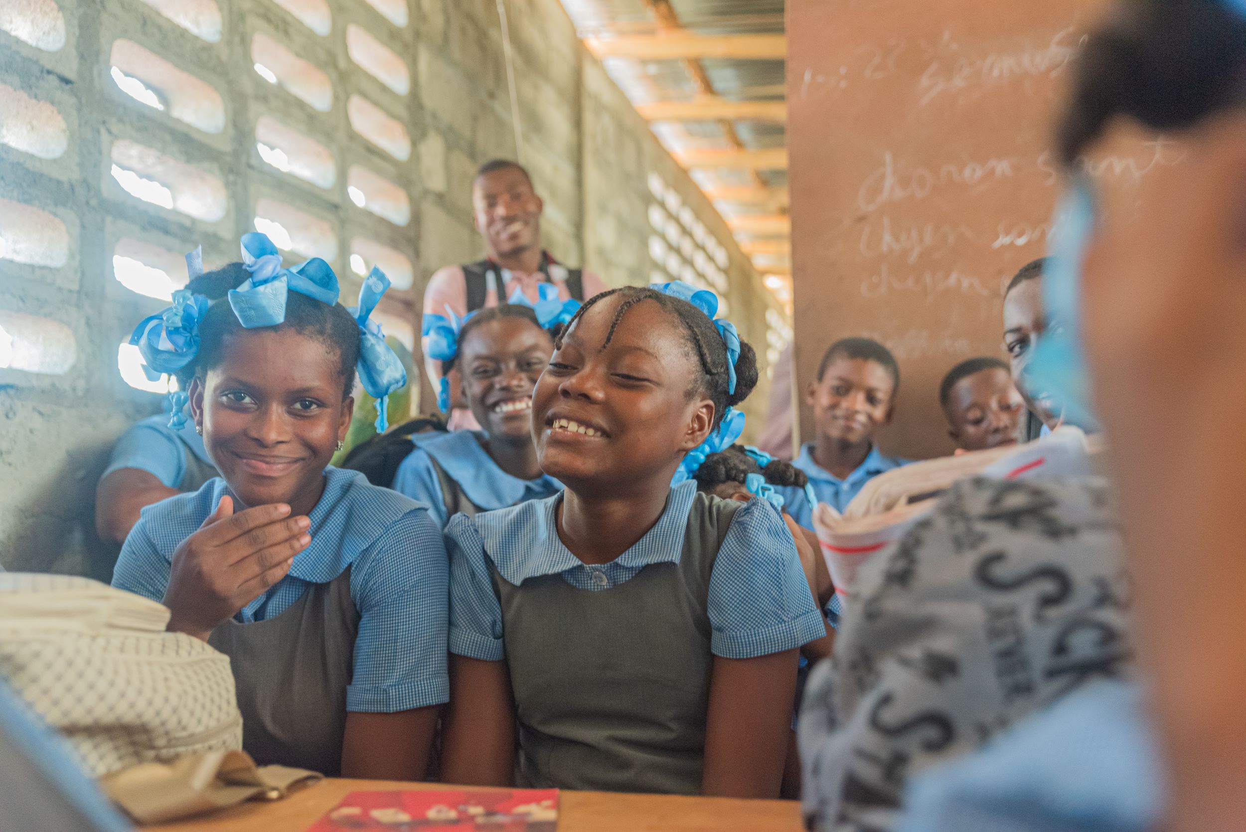 Smiling school children in their classroom