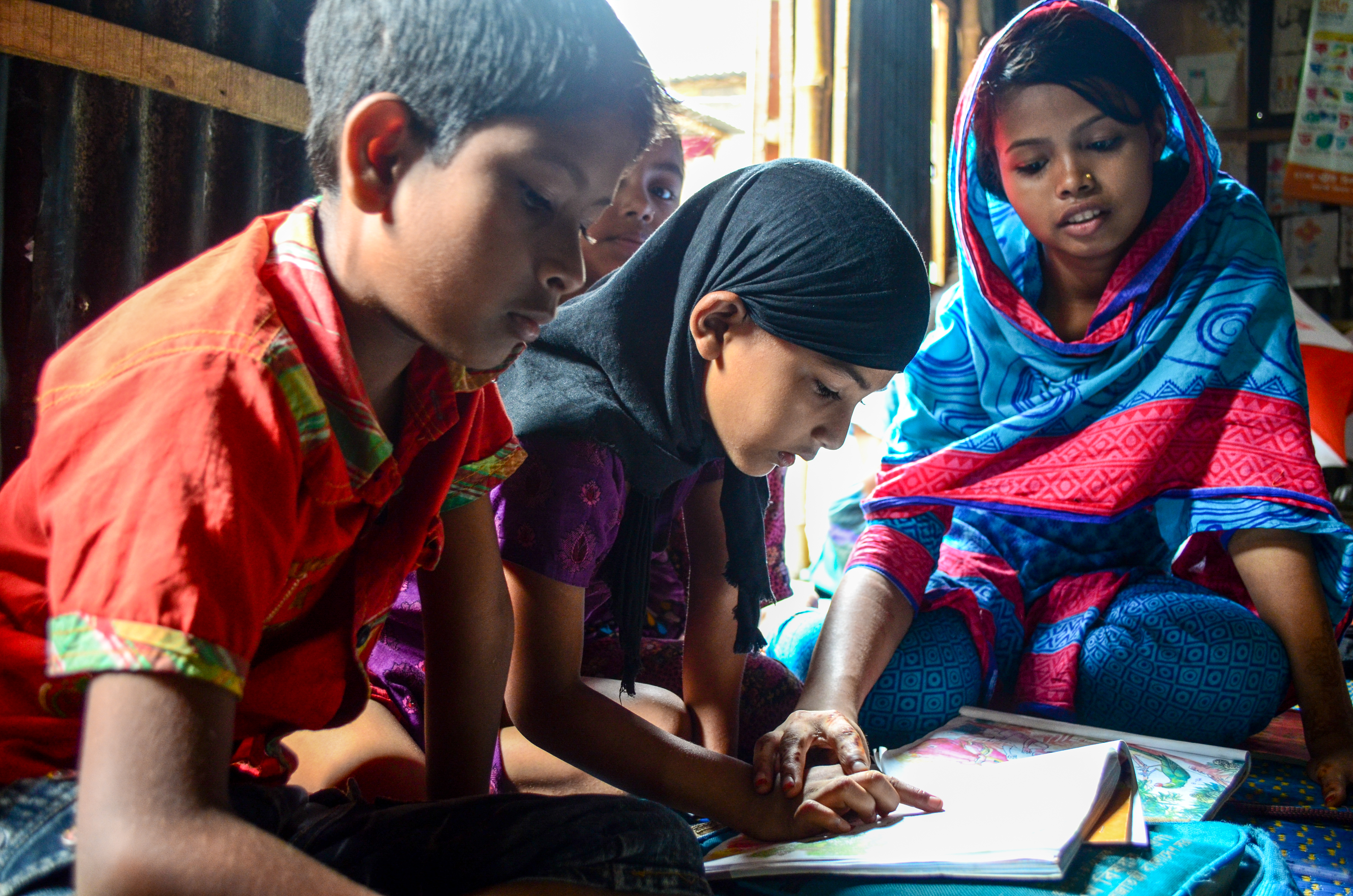 Bithi attending World Vision's education classes for children no in school.