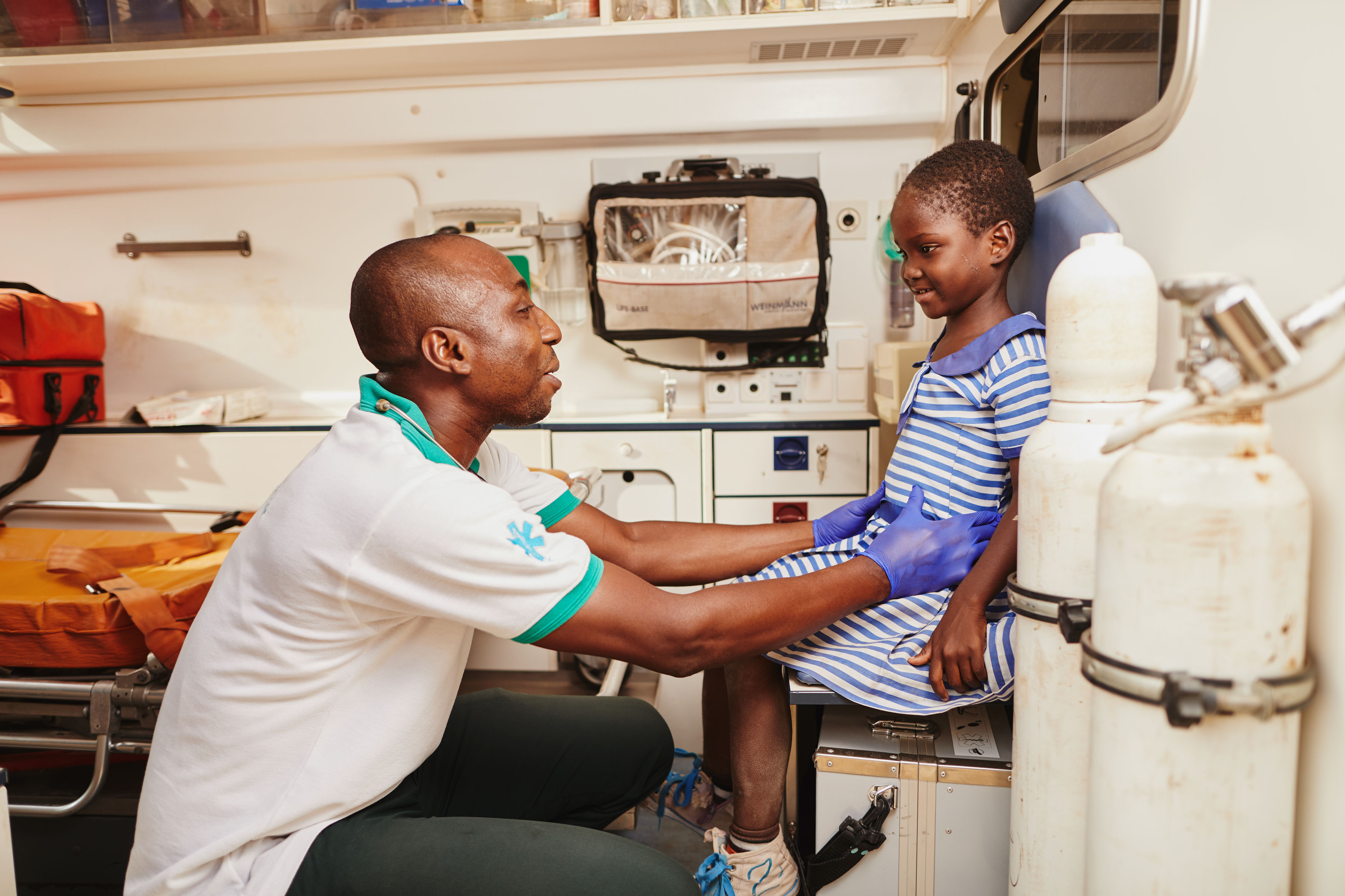 Child is checked by doctors