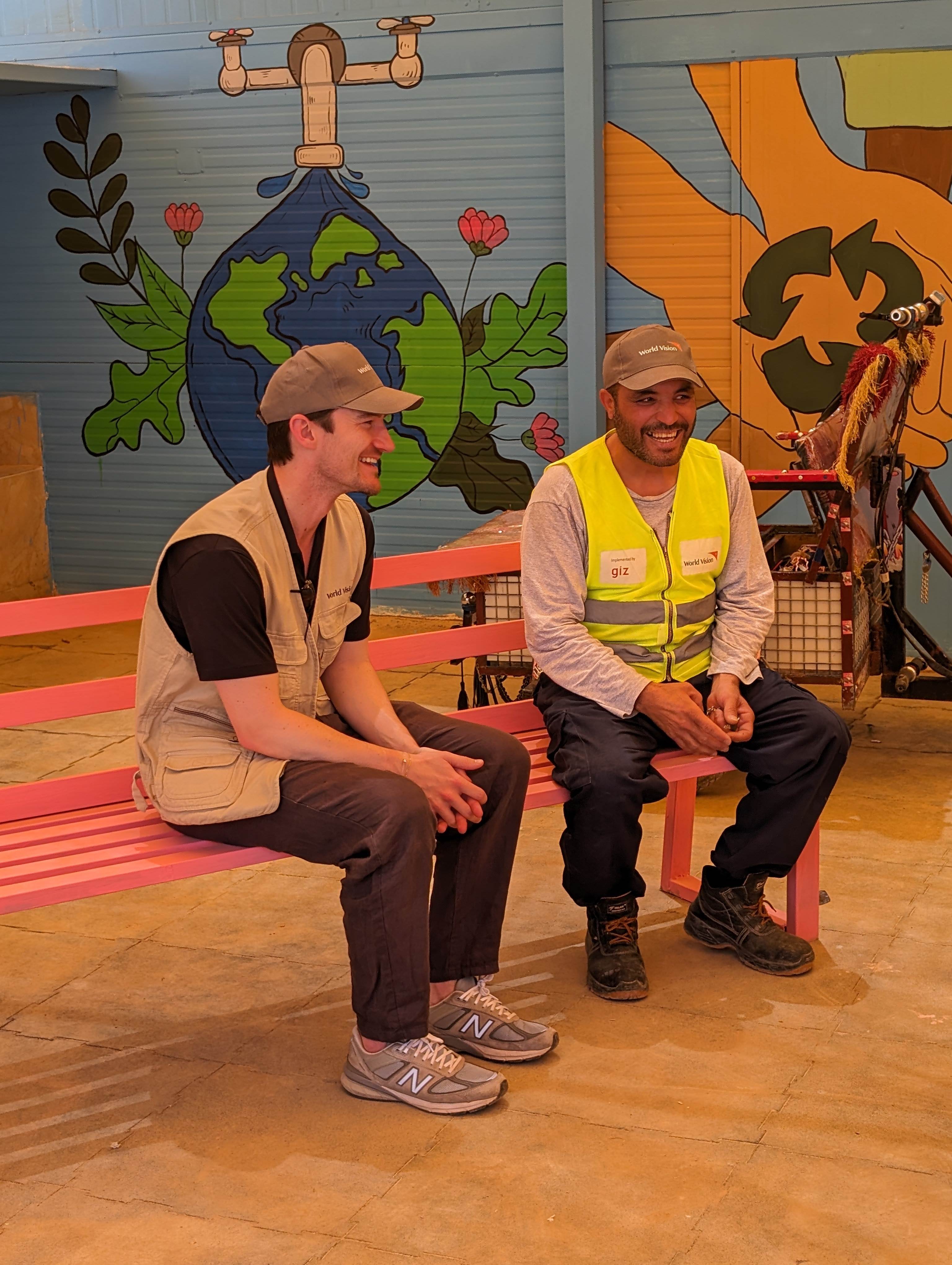 Brett Staniland engages with a World Vision staff member