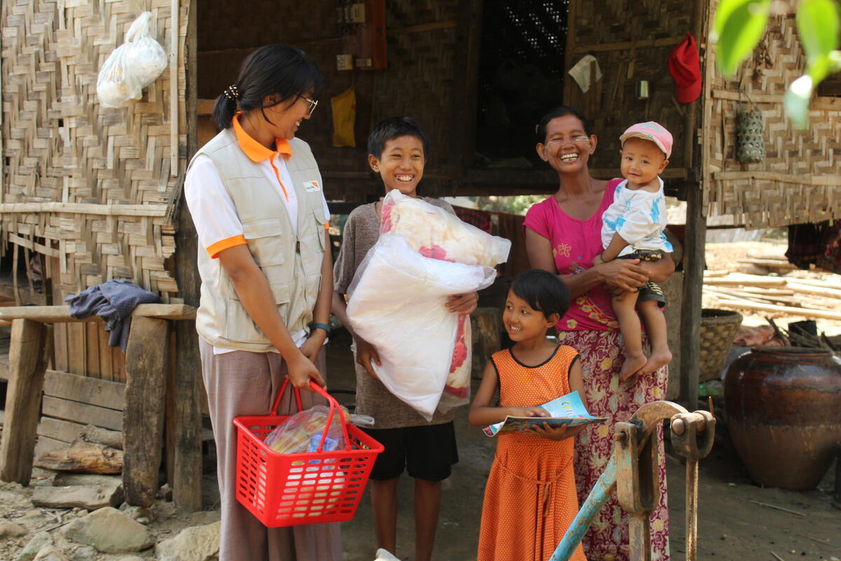 Chang and his family receiving support from World Vision after the floods