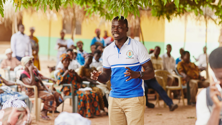 Nurse Alexander leads a training session with the community