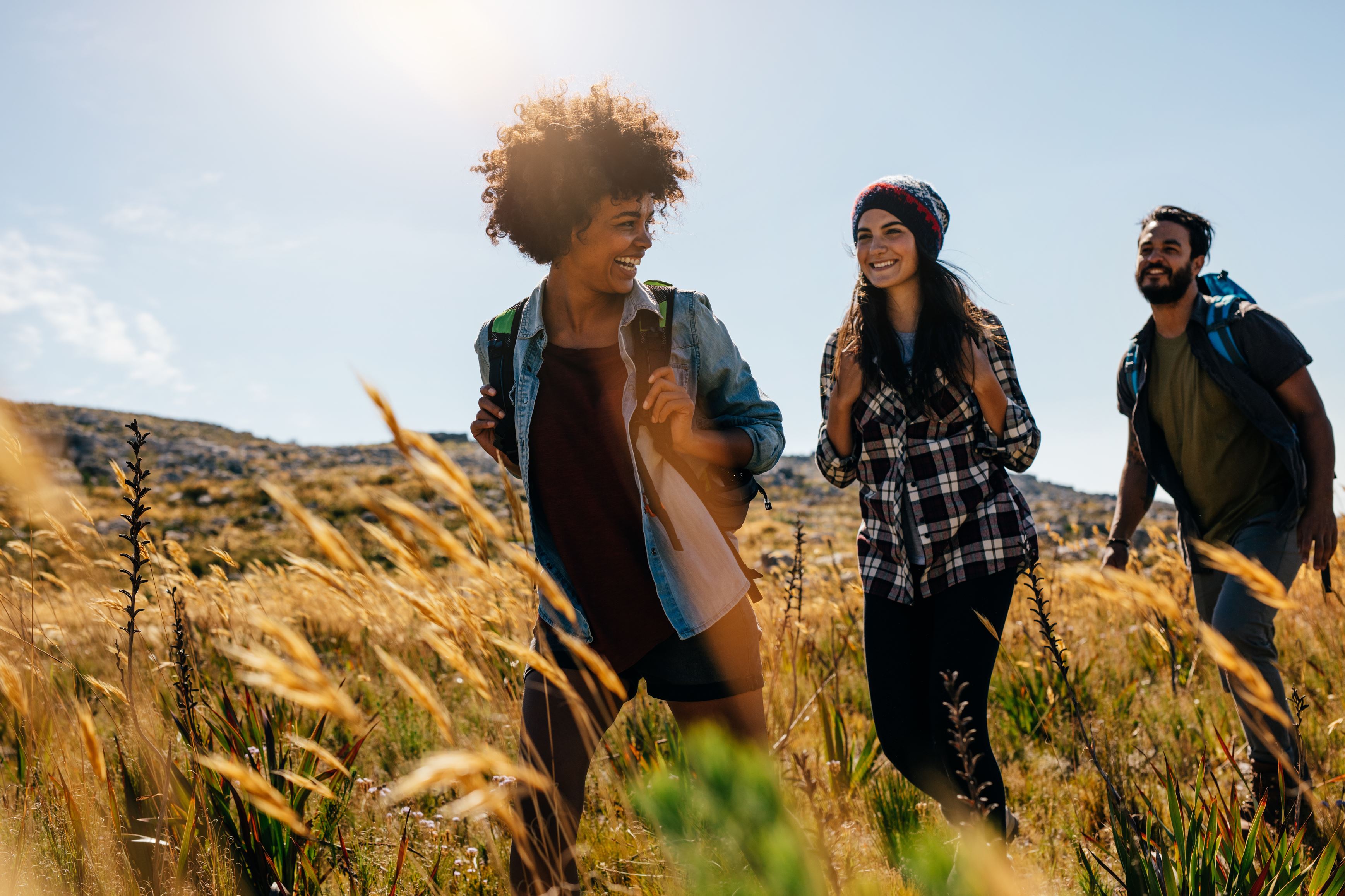 Group of young adults enjoying a walk together 