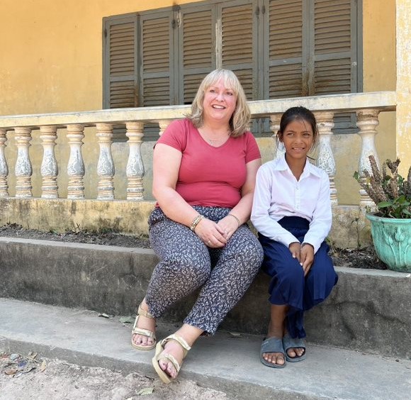 Woman and child sitting, Cambodia