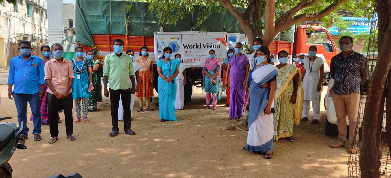 Medical staff in India wear some of the new PPE they've received