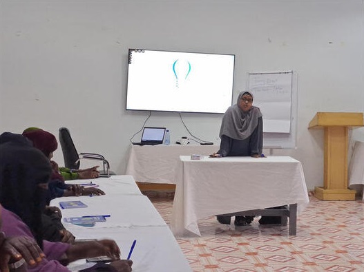 Women in a room attending a workshop