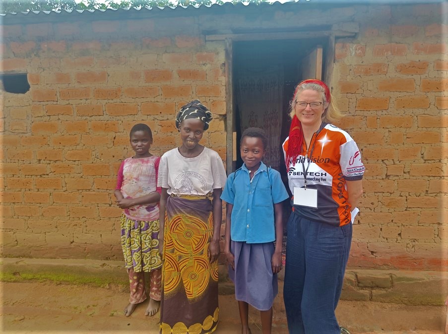 World Vision worker with Zambian children