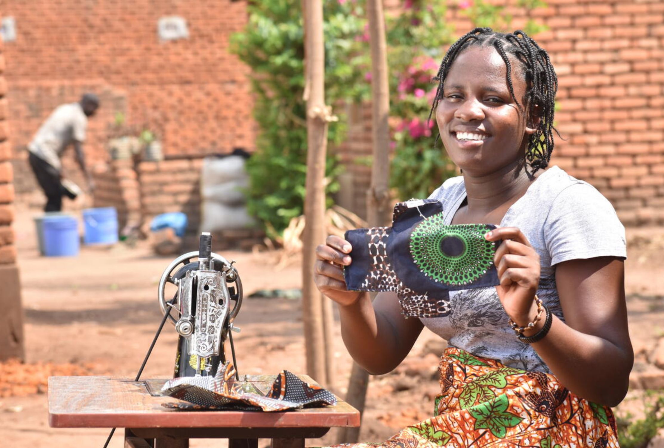 A girl looks away from the camera, her face covered in shadow as she recounts her traumatic child marriage.