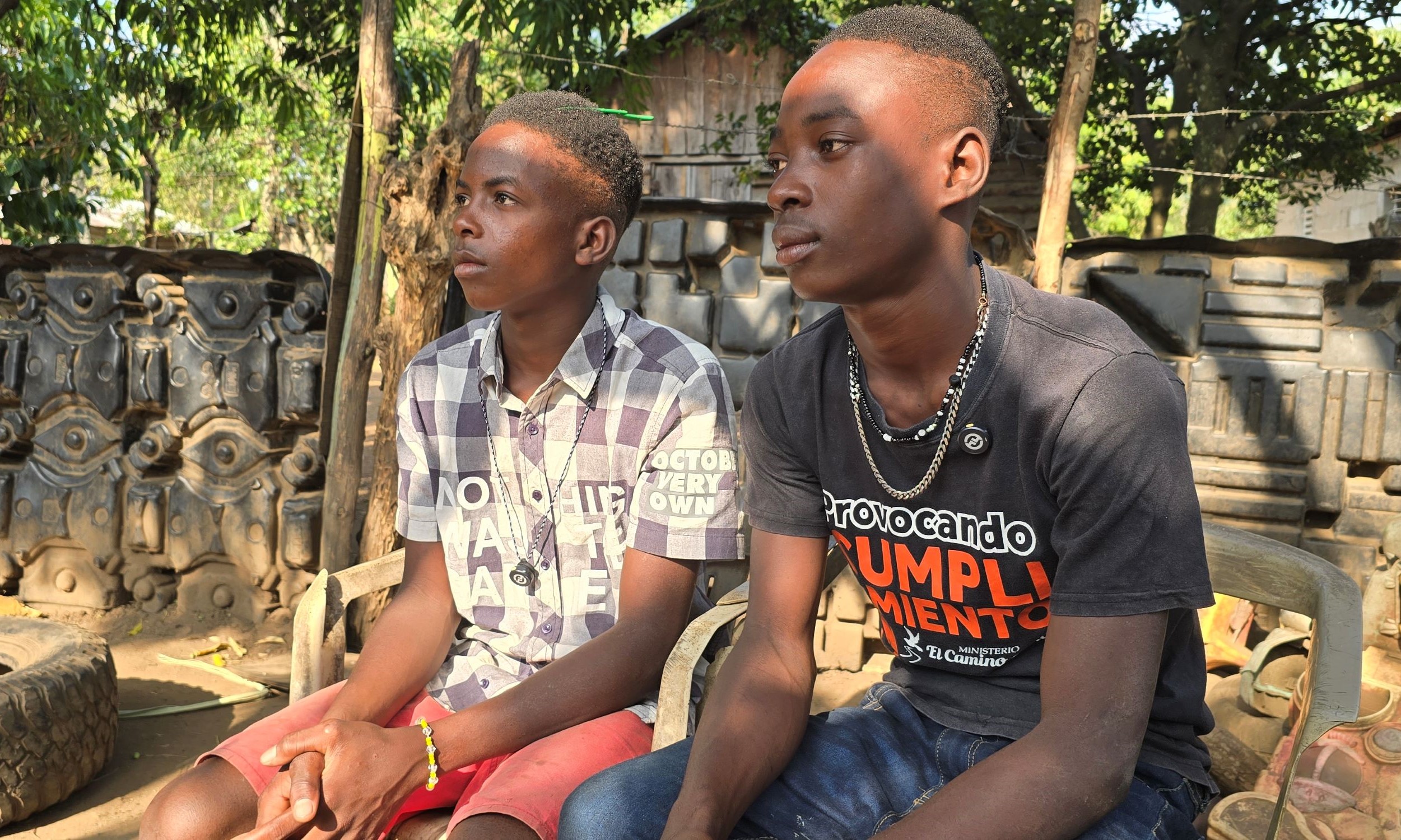 Two brothers who fled the Haiti violence and food shortages on foot