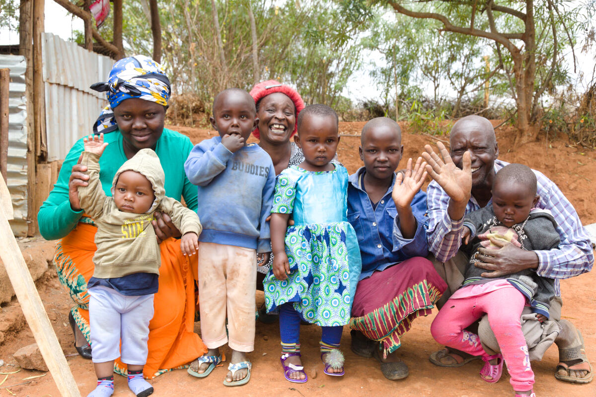 Veronica from Kenya and her family at their homestead.