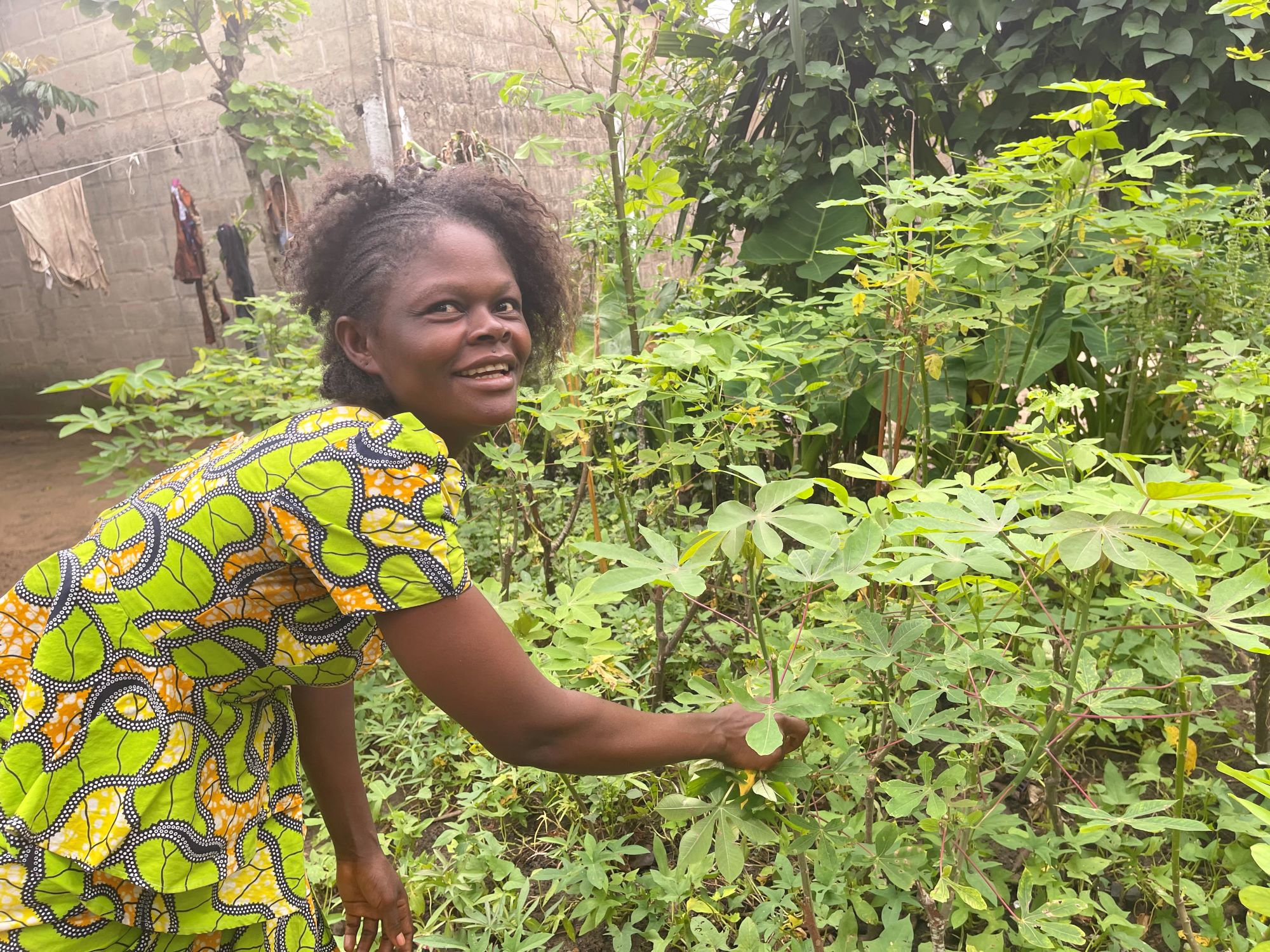 Woman in DRC tending her garden plot