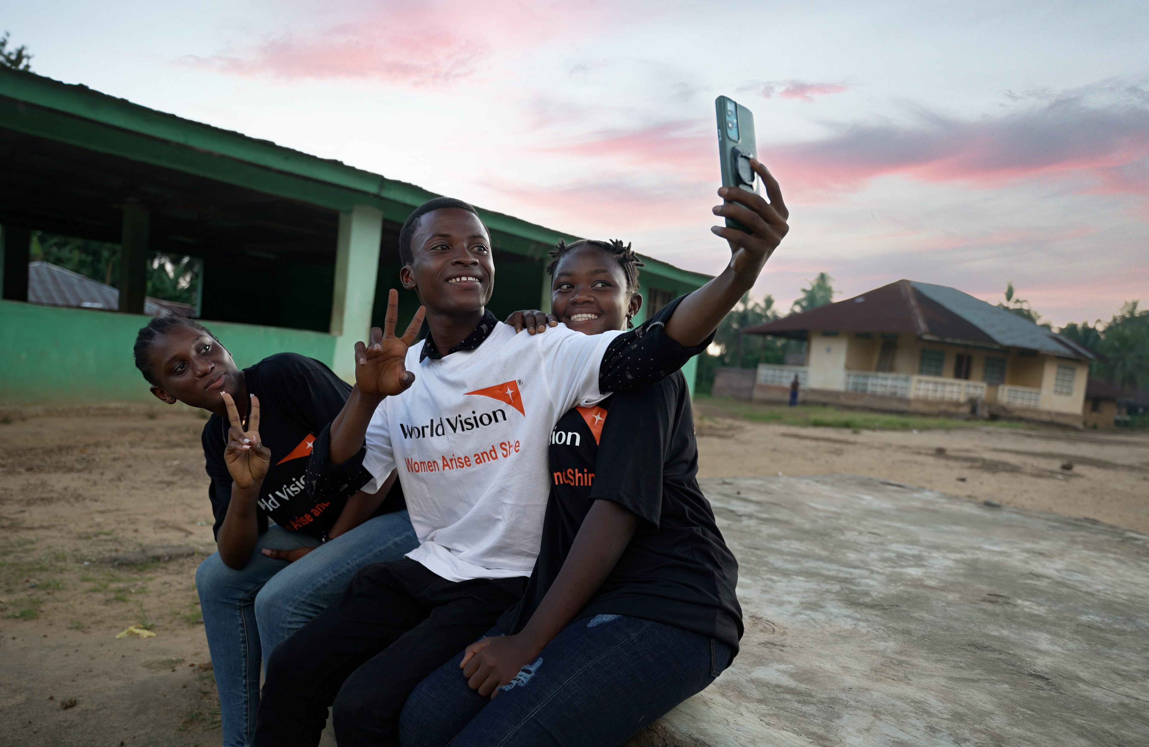 Children pose for a selfie in Sierra Leone