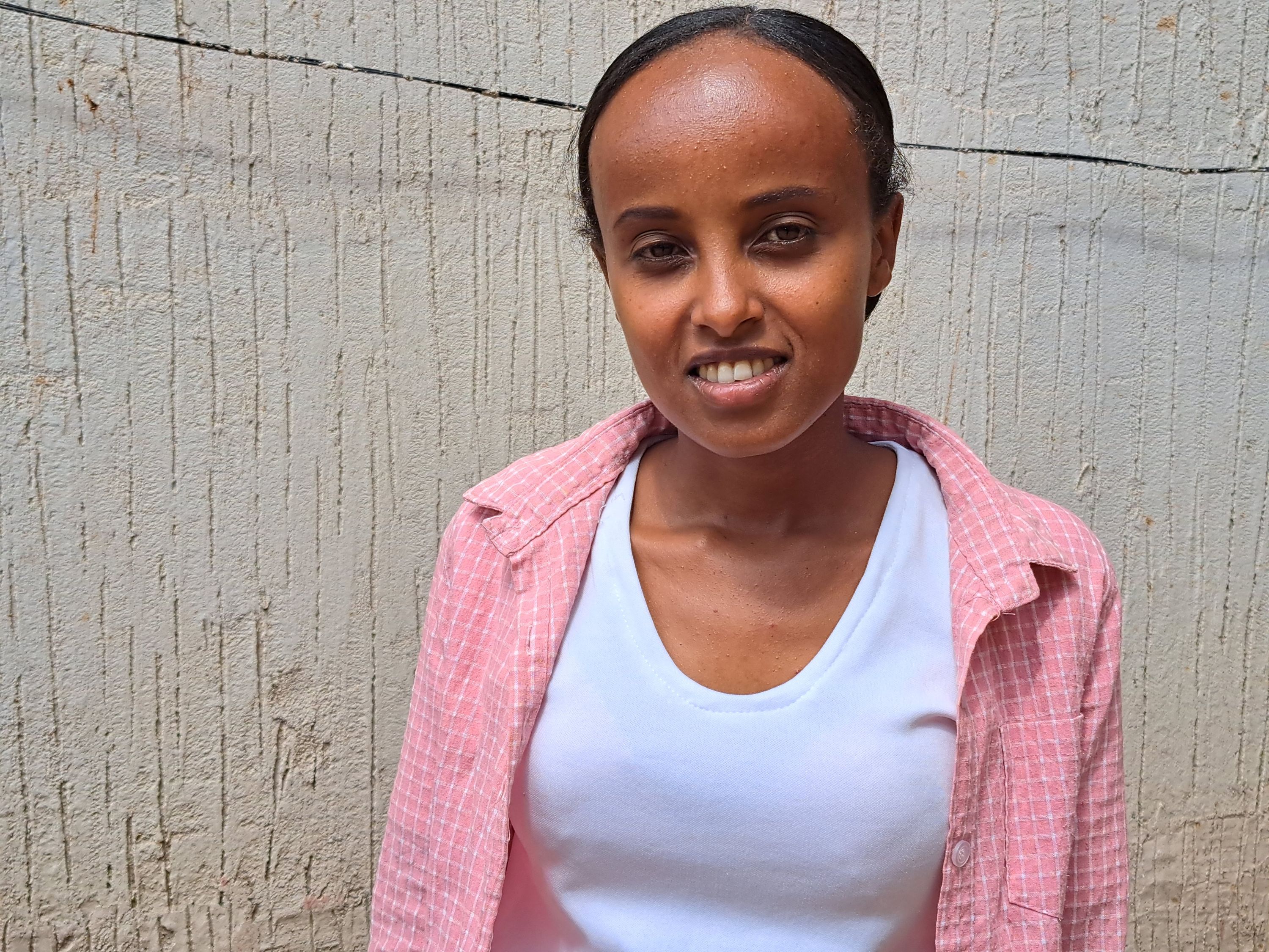 From orphan to graduate, at 24 Martha has overcome so much