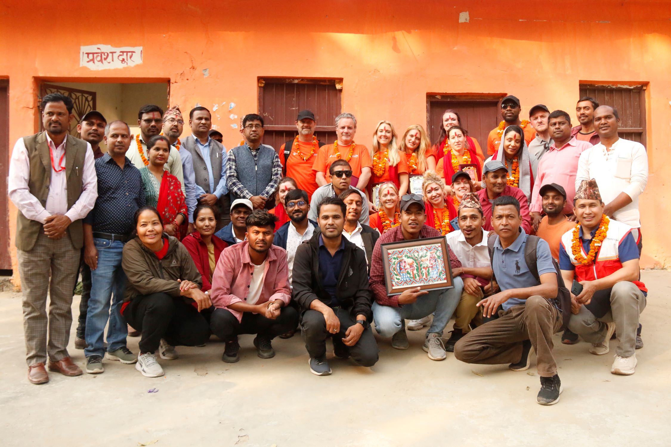 World Vision UK and Lightsource Foundation and Nepal community in Sarlahi posing for camera