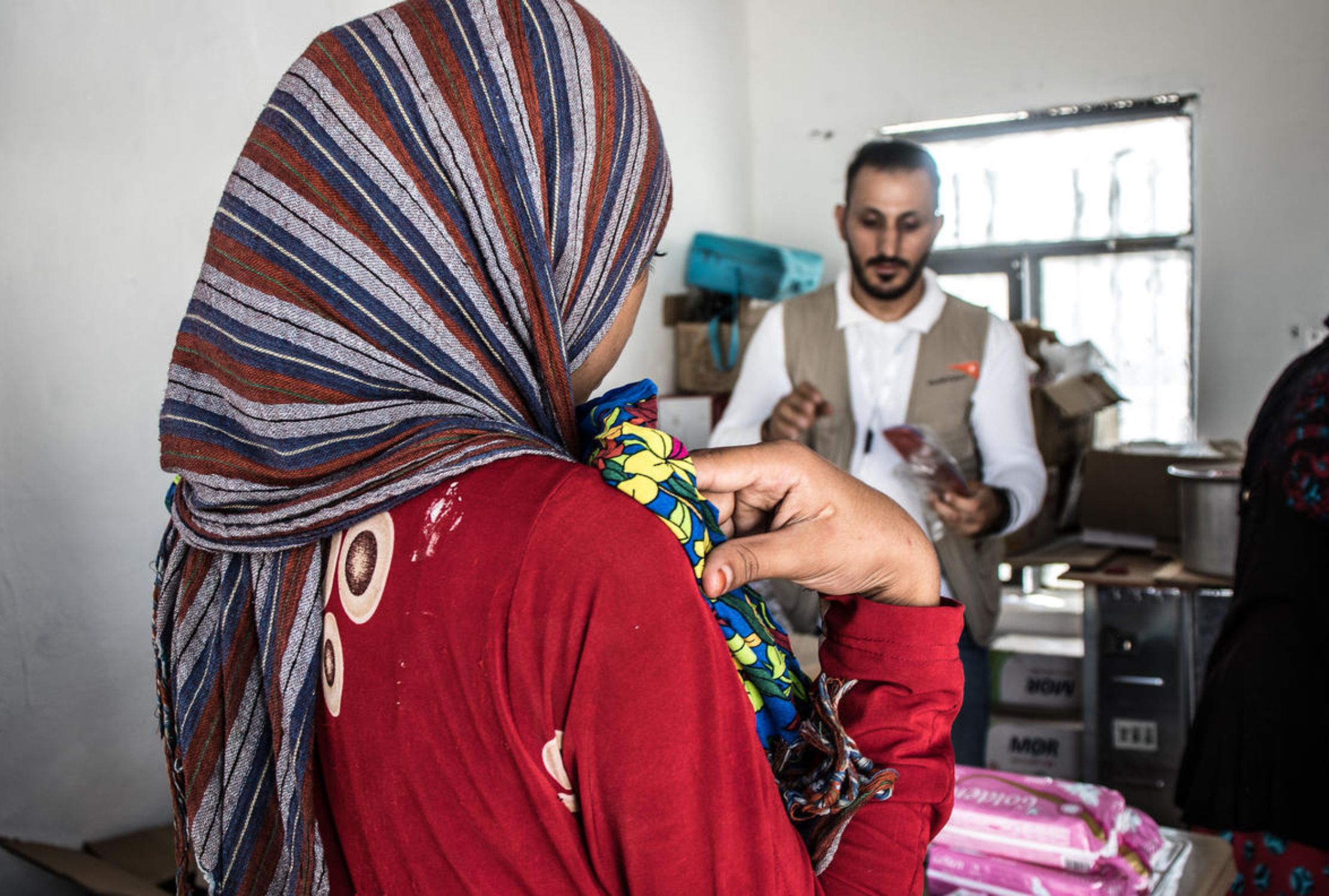 Female child bride from Iraq facing away from the camera