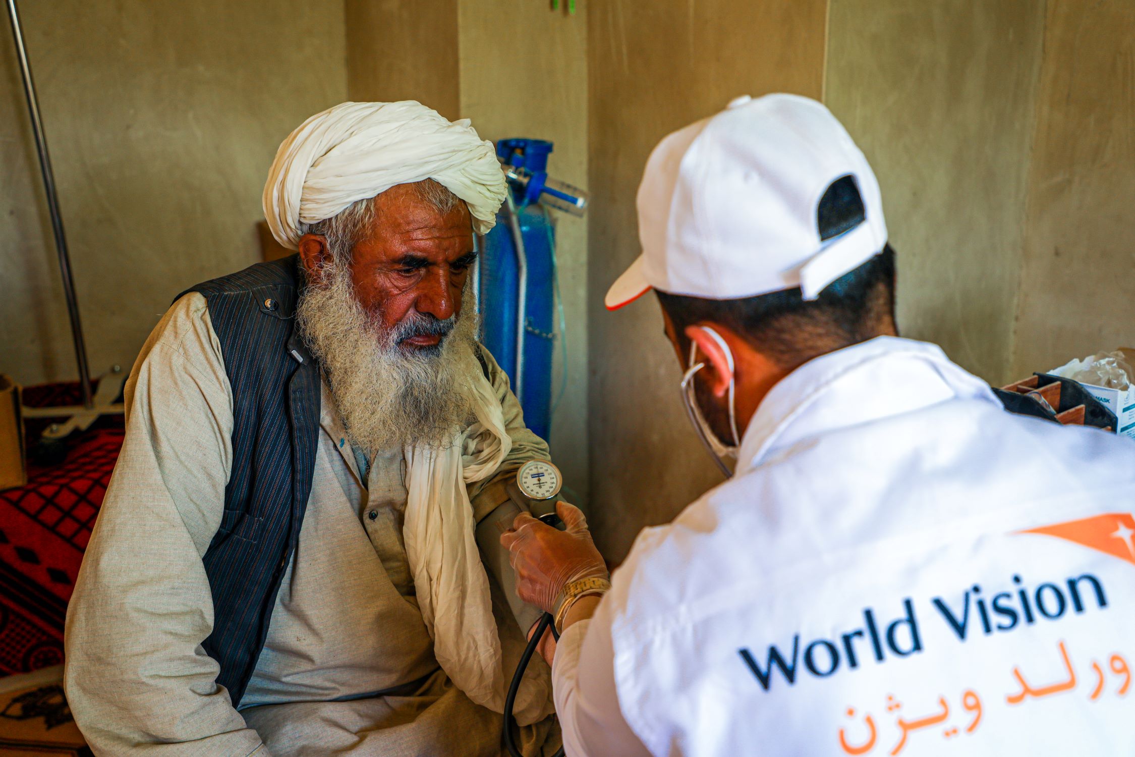 Afghan man receiving medical care