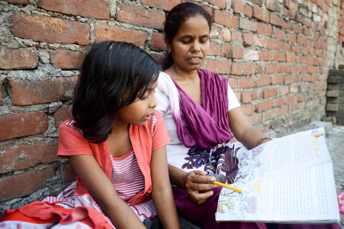 Sonali and World Vision volunteer, Prema who teaches at the World Vision initiated transit school in Kanouria, where Sonali goes for extra coaching. 