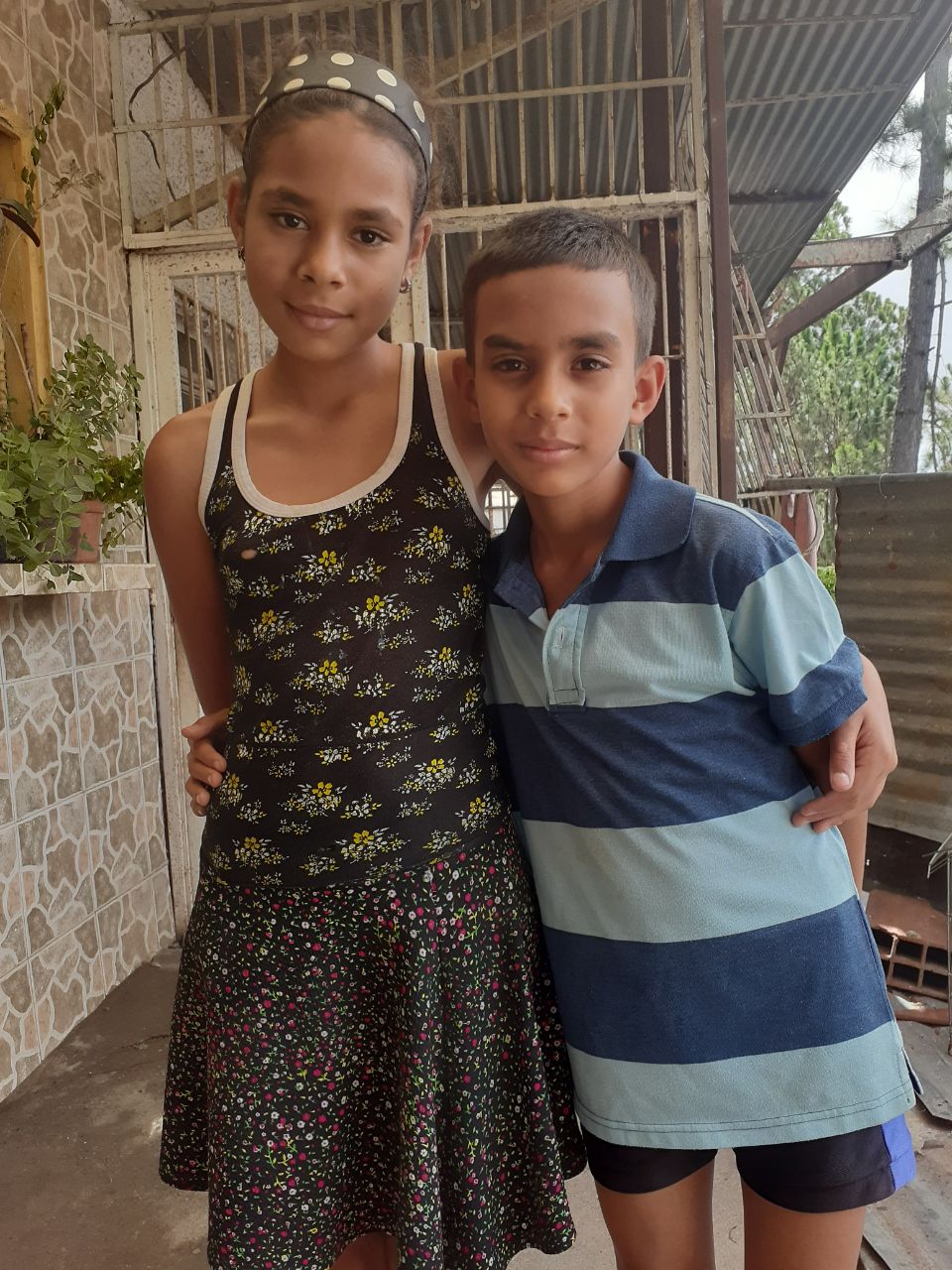 Two children smiling at camera in Bangladesh