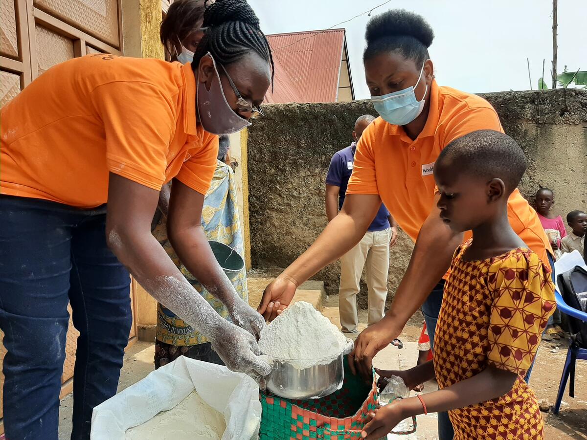 A young girl is fed nutritious food