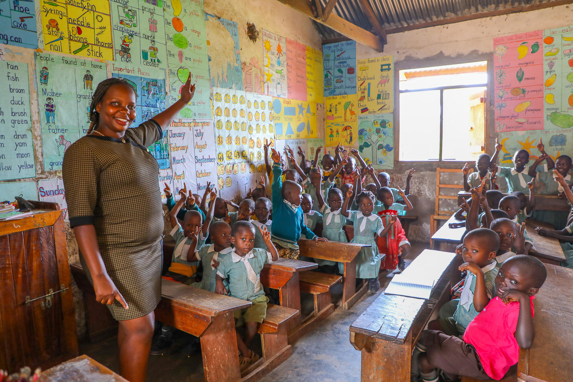 Former sponsored child, Mary, inspires the next generation in her classroom.