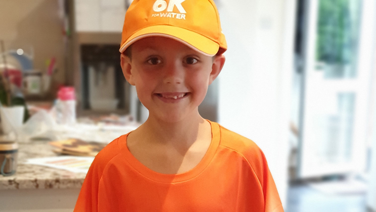 Young boy in World Vision clothes