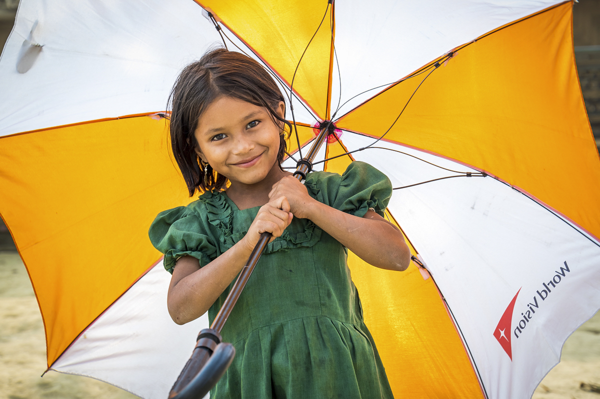 Jannatul, 5 holding umbrella in Bangladesh
