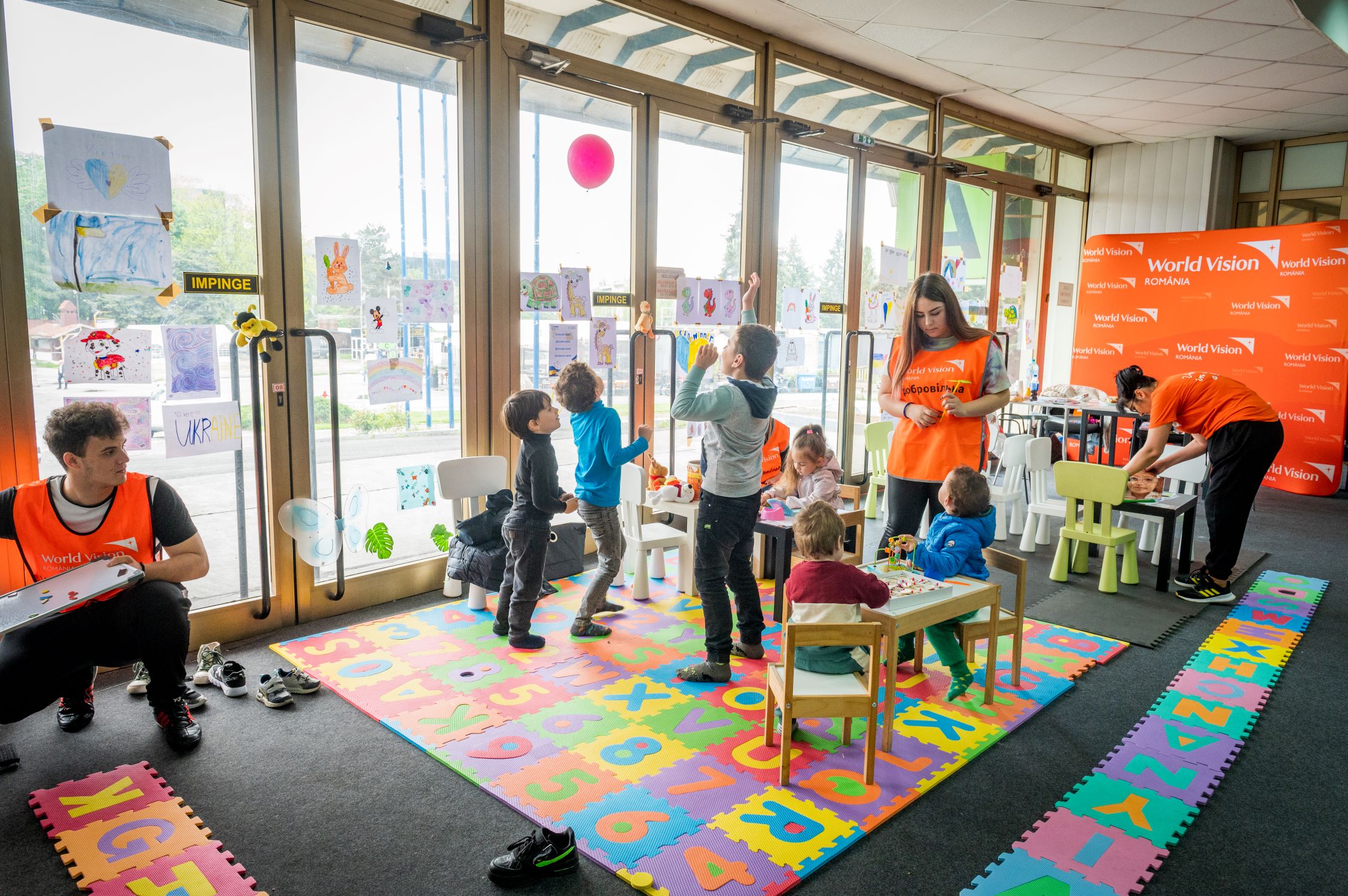Ukrainian children playing in a World Vision child friendly space in Romania