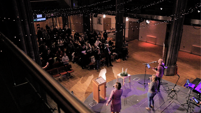 Band play in a church in the UK