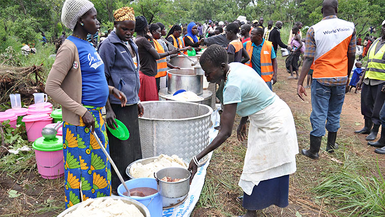 Meals are provided to refugee families when they first arrive in Uganda