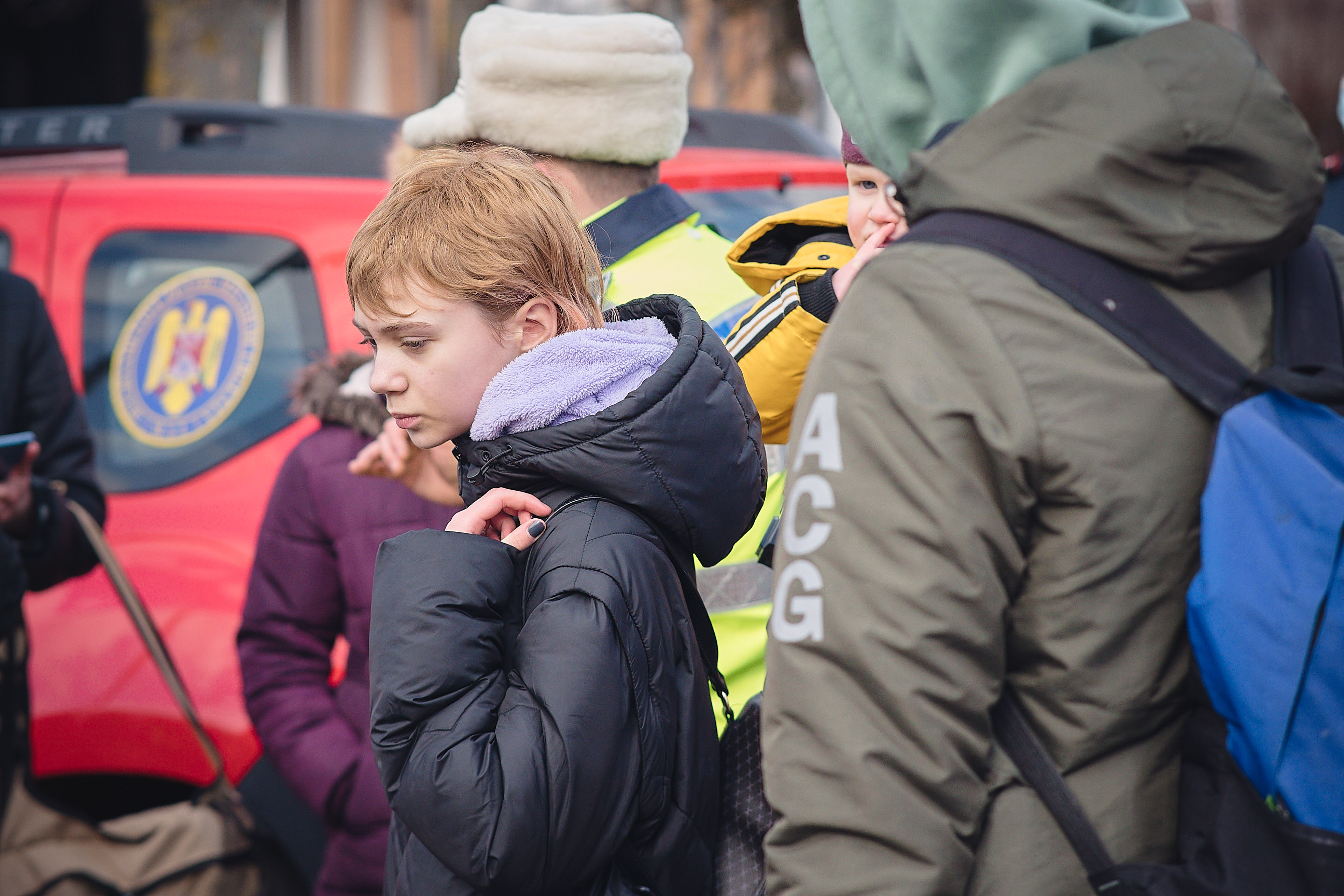 Children of Ukraine in freezing cold weather near the border