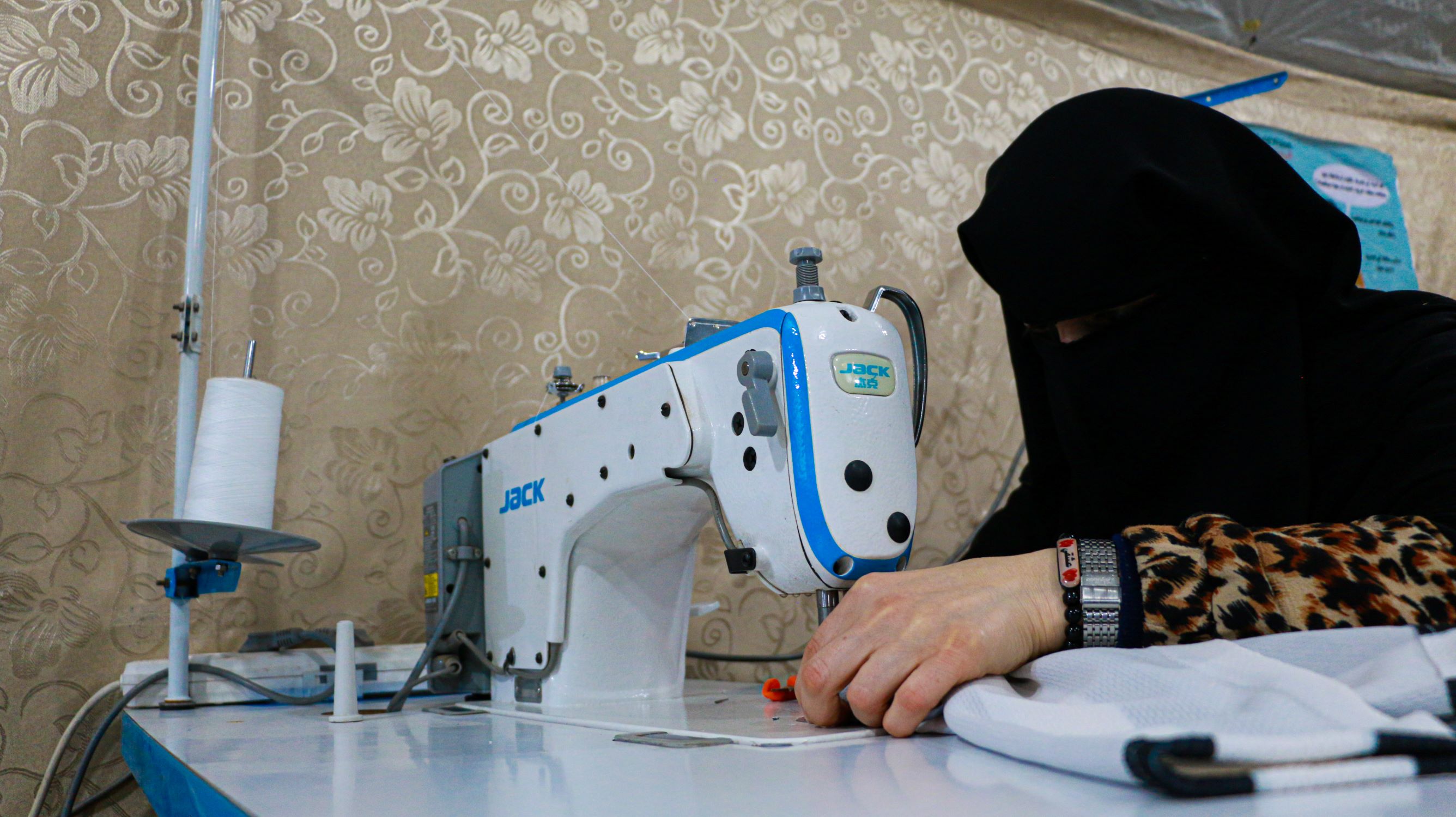 Samar at her sewing machine