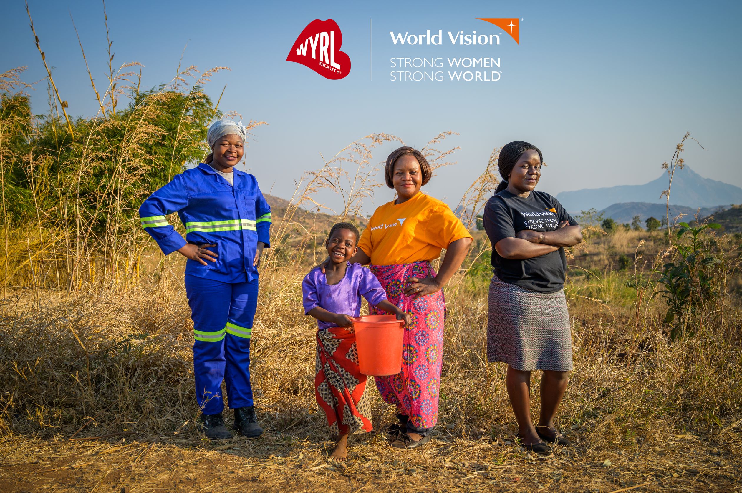 Women and girls standing together feeling empowered with the World Vision and WYRL logos
