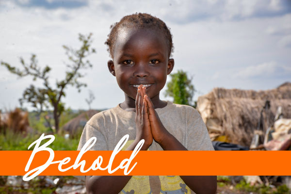 Young girl hands together praying