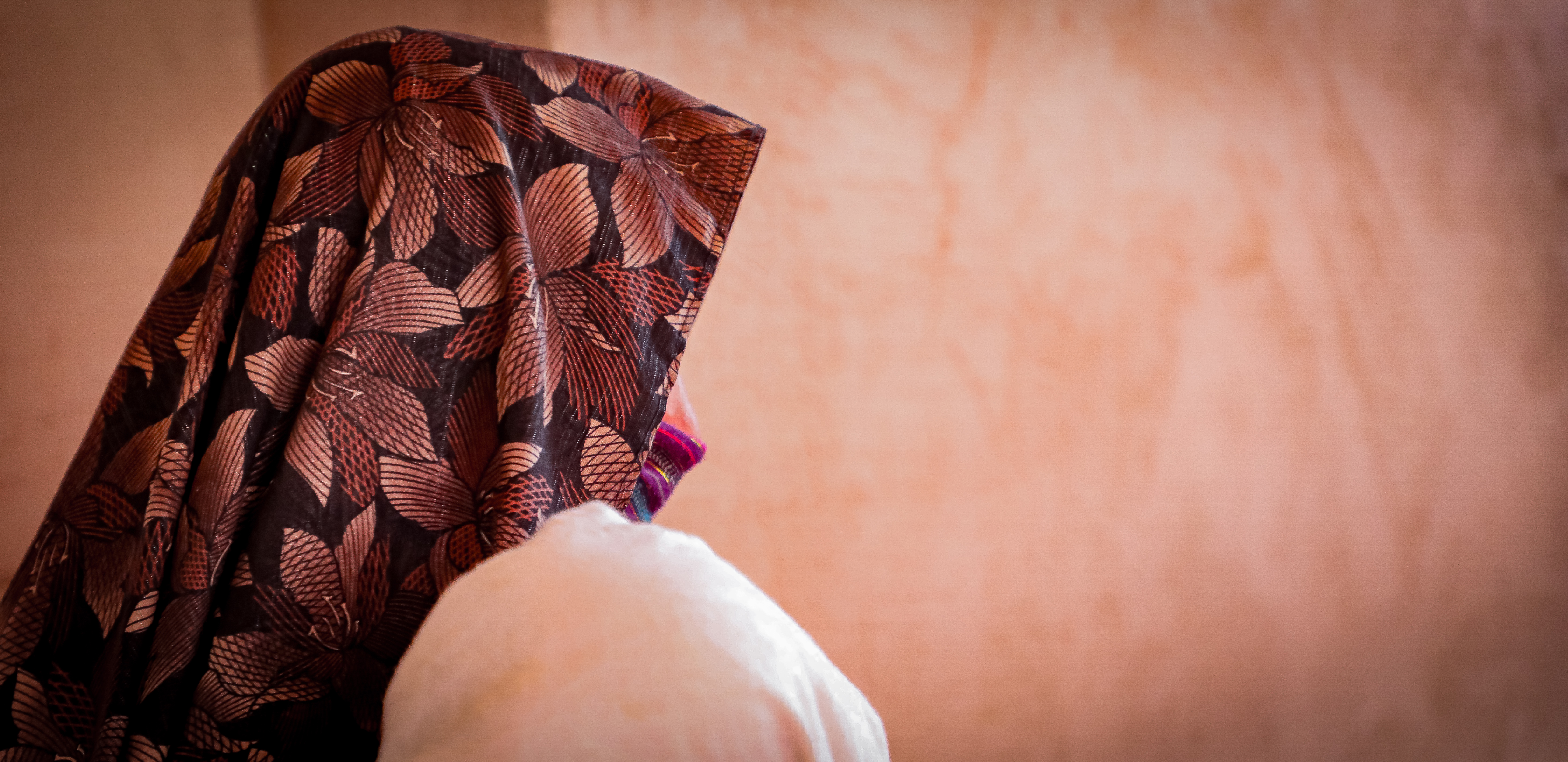 Woman and child looking away from screen