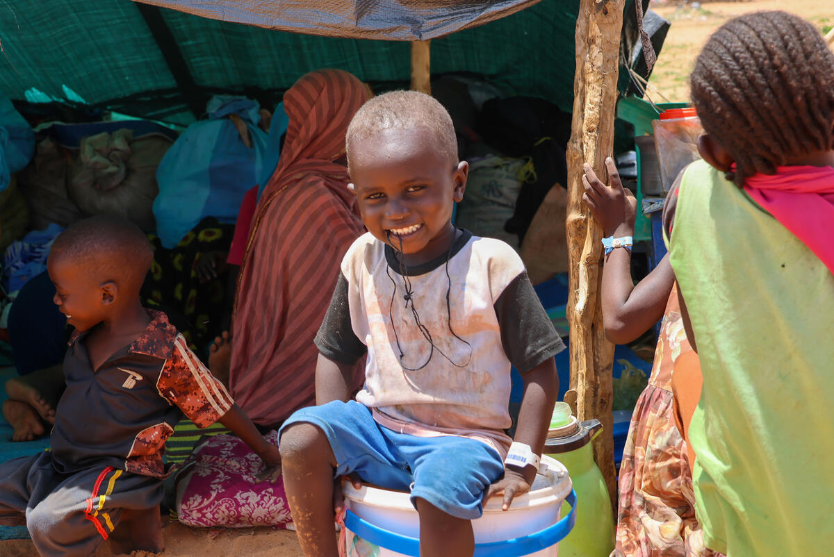 Child sits in IDP refugee camp, Chad