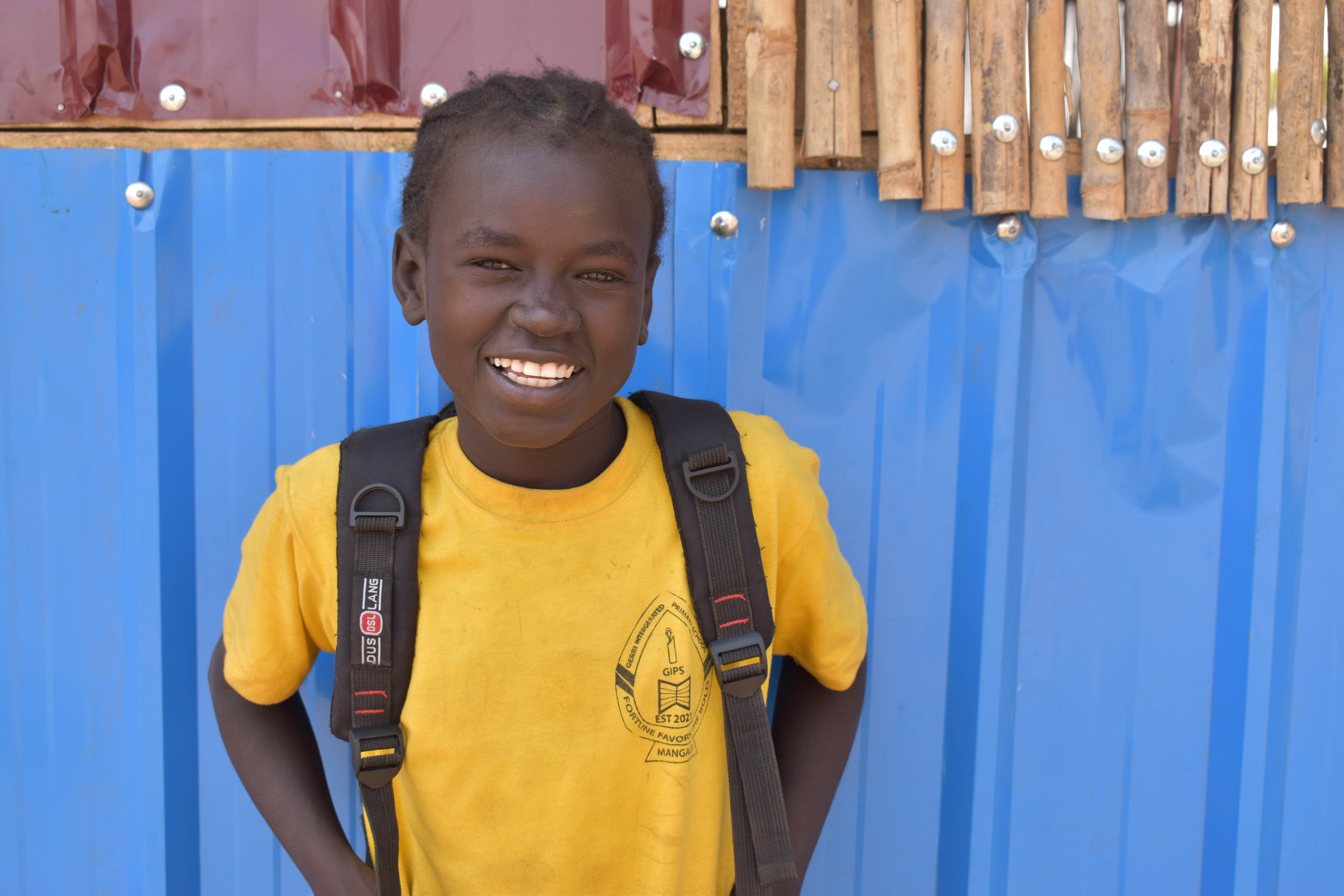 Yar a 14-year-old pupil South Sudan smiling.