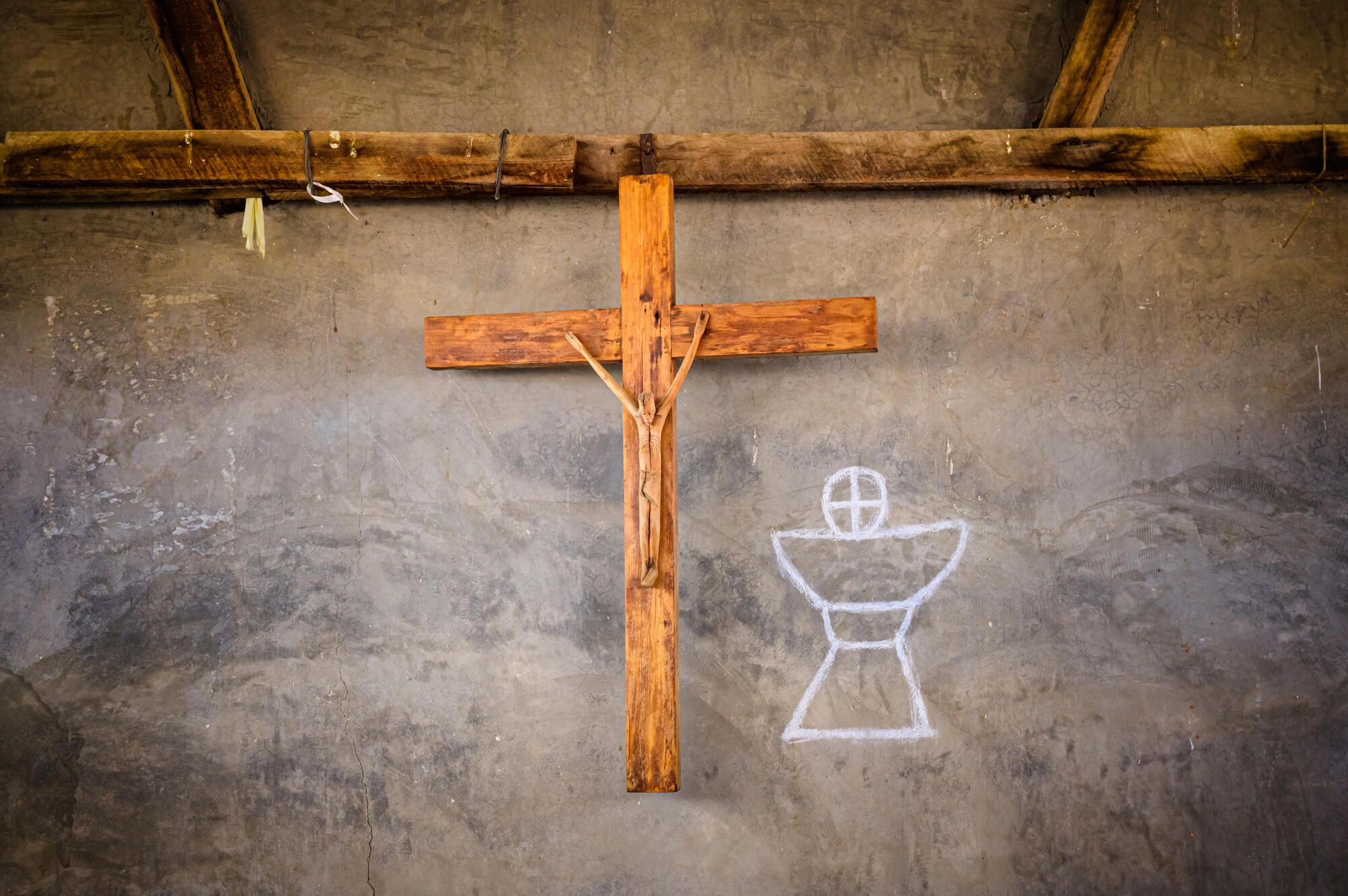A wooden cross in a church in Kenya