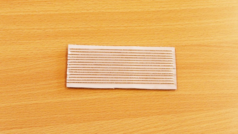 Step 2: Wrap string around the loom 