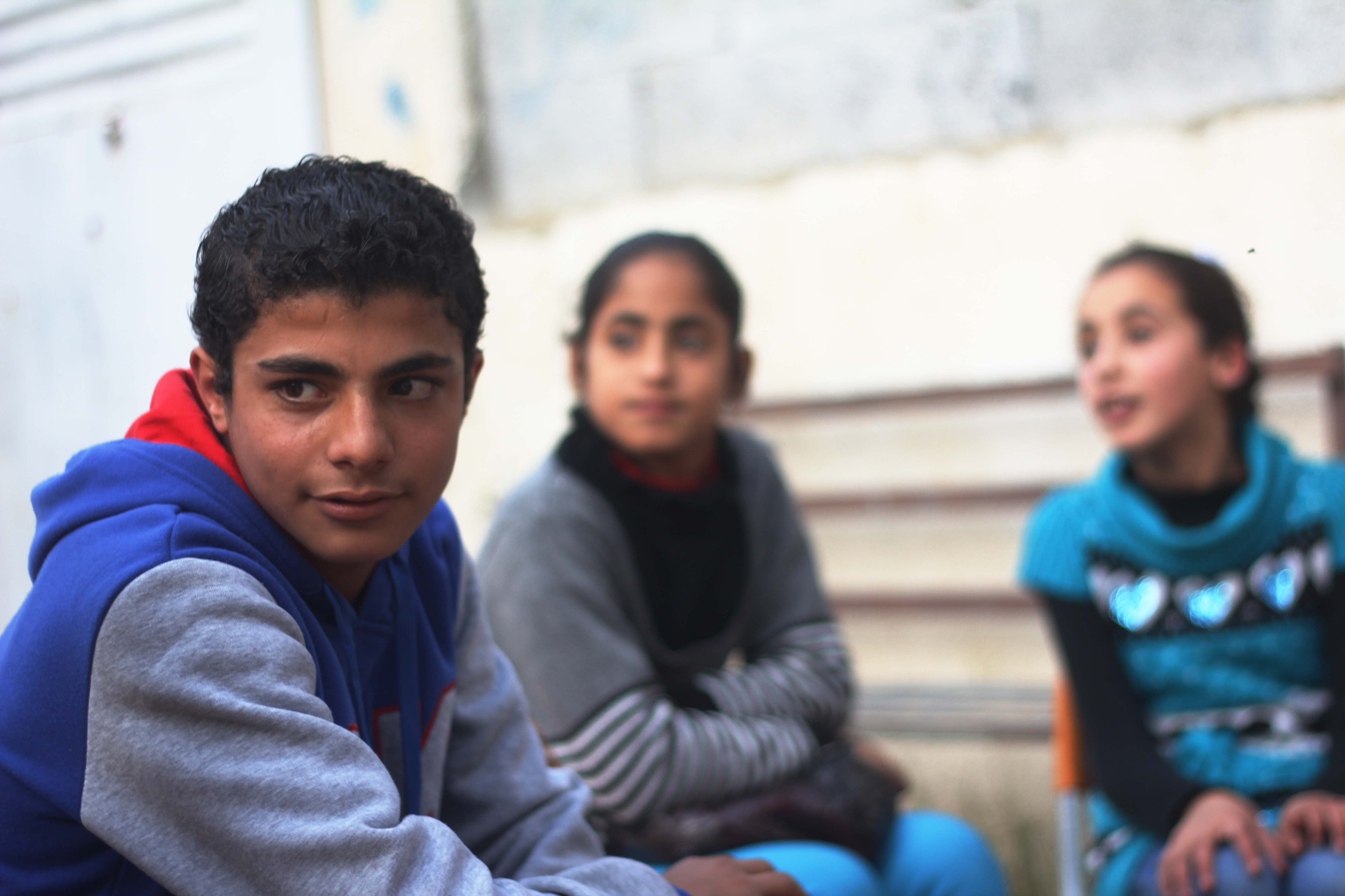 Mousa with other children at one of World Vision's Child Friendly Spaces