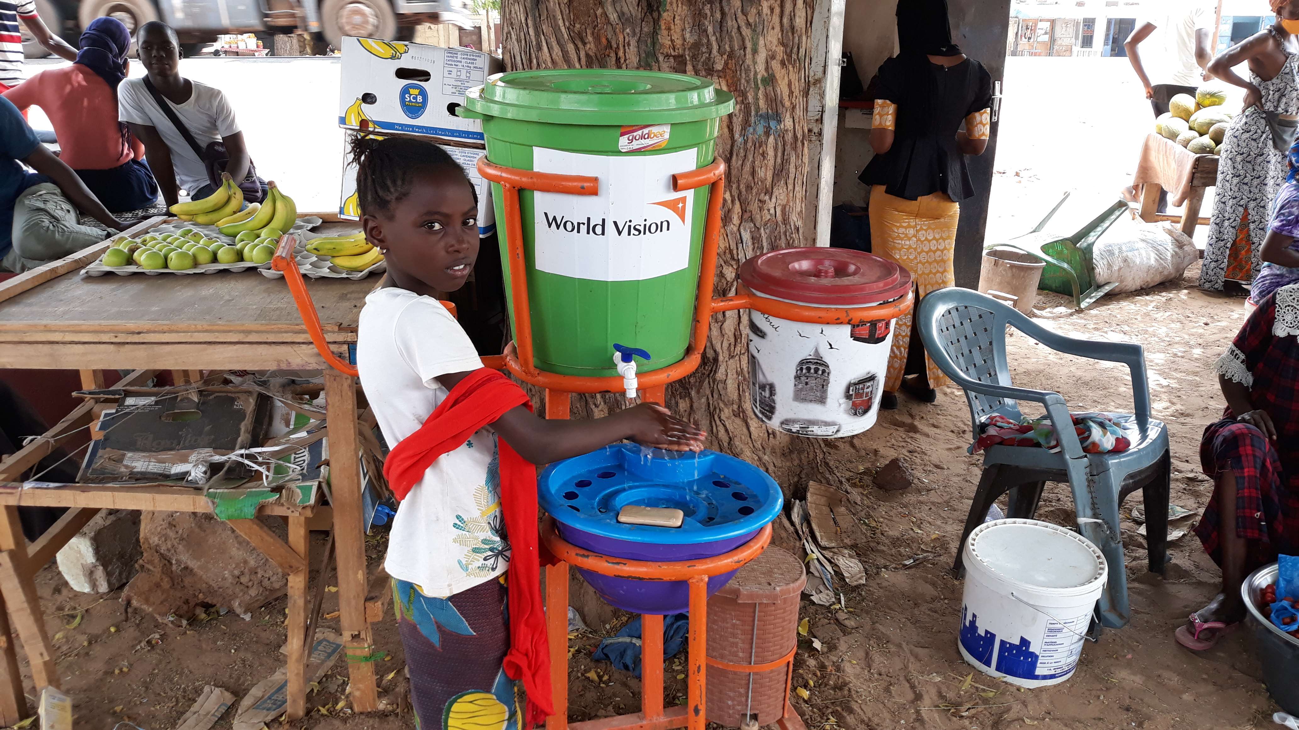 Child at a water station