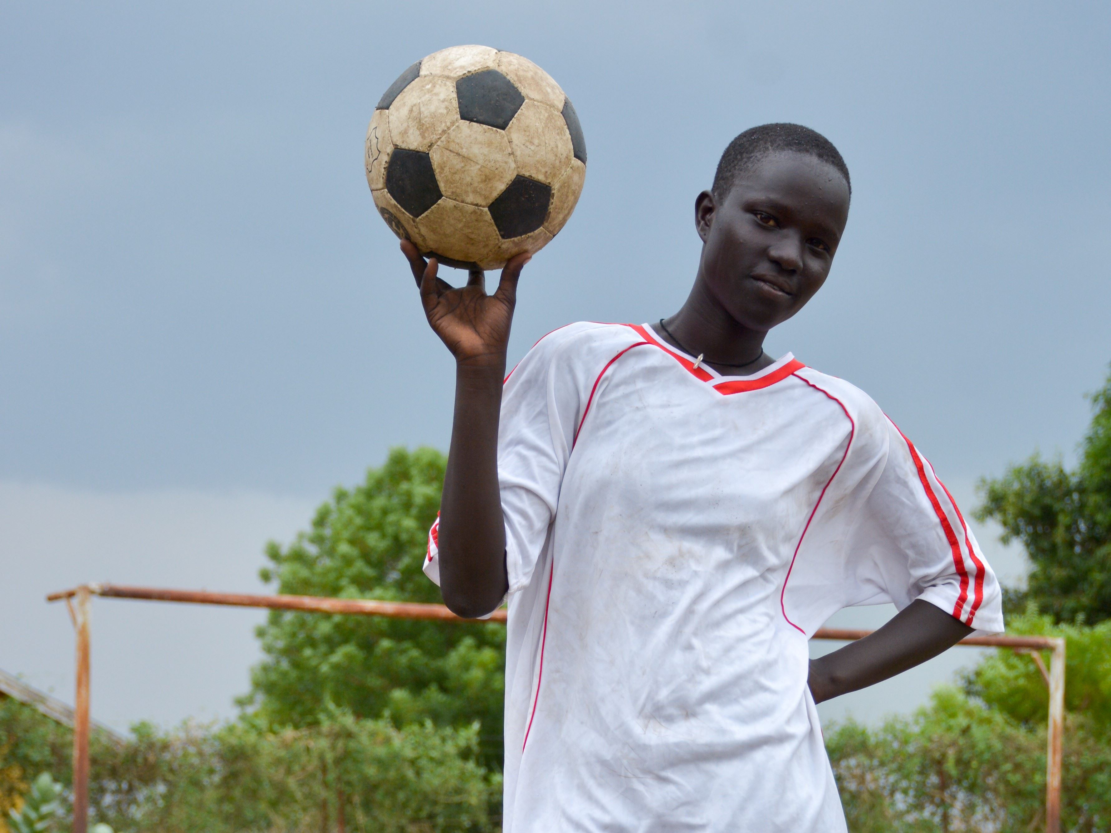 14-year-old Margaret feels happy when she plays football