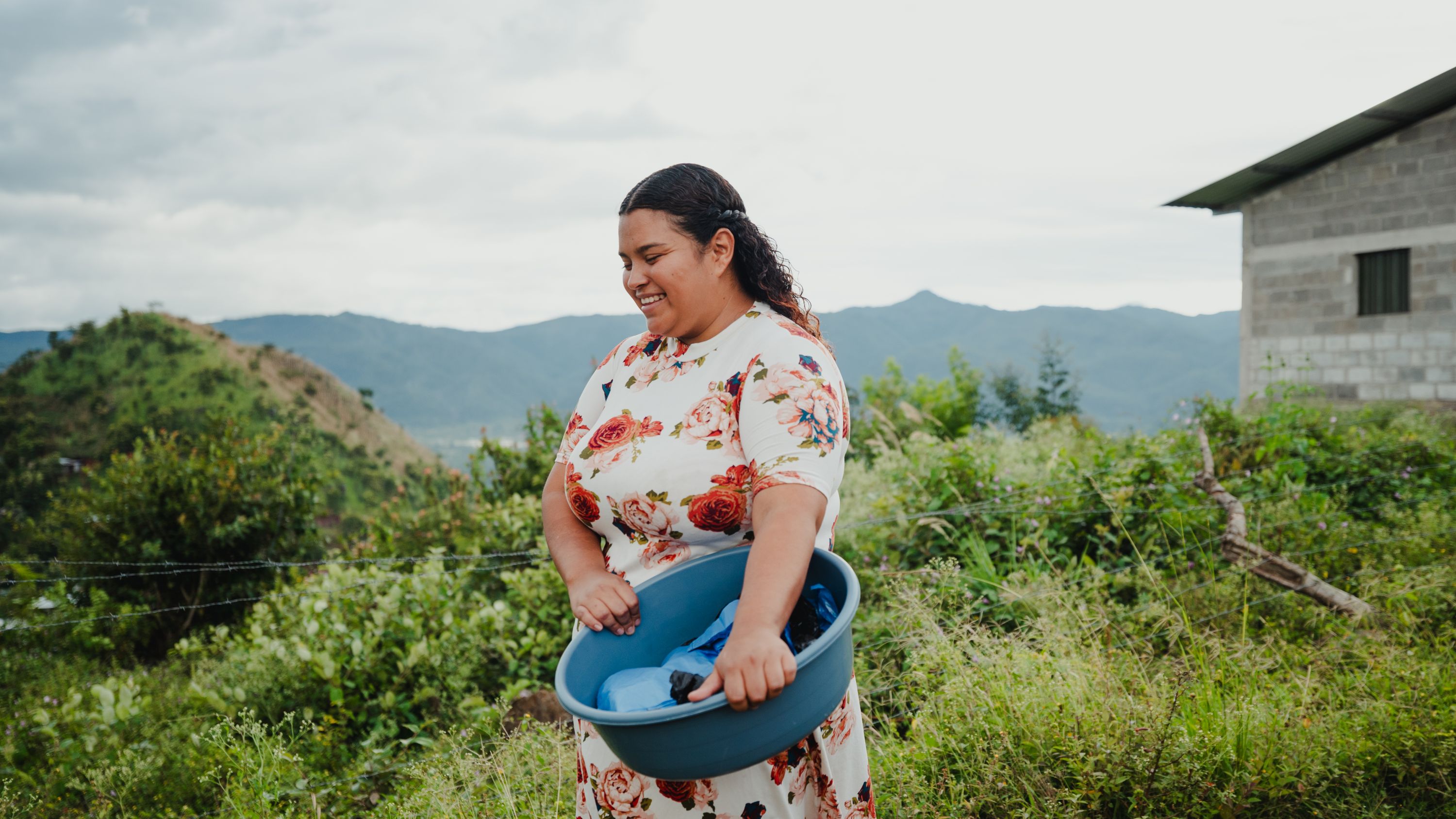 Smiling and grateful, Lisbeth has plans to build her home and own a bakery