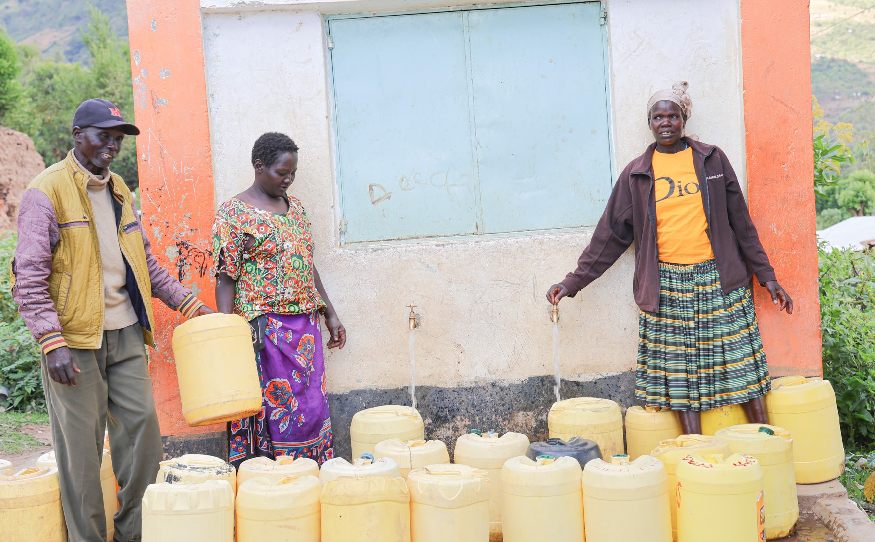 People with water containers in Kenya