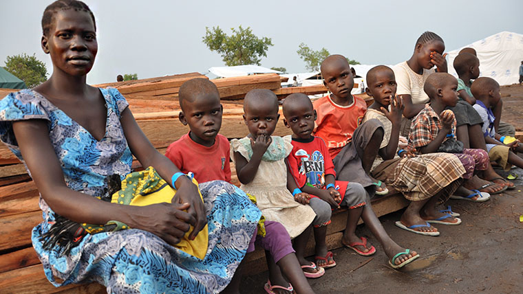 Kiden, 25, sat with her six children with her seventh child on the way